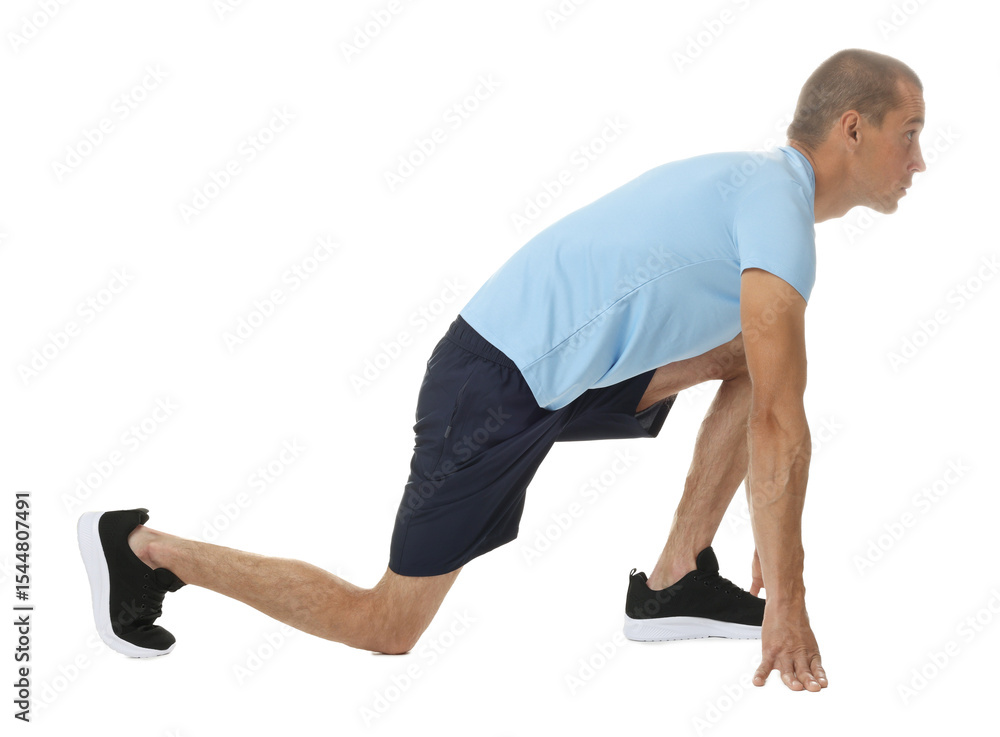 Naklejka premium Runner in starting position on white background