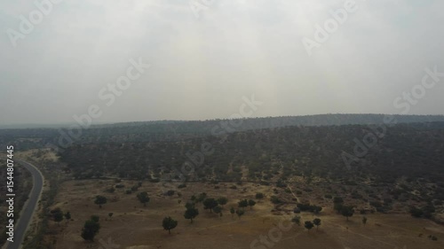 morning mist over the mountains of thar desert (Pan shot)