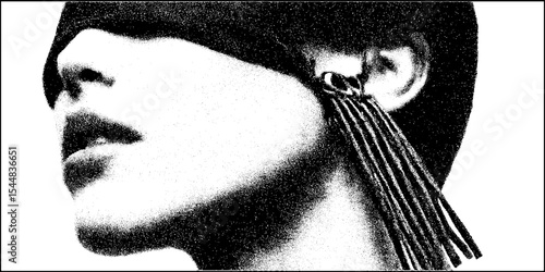 Abstract high contrast portrait featuring tassel earring and mirror shard elements