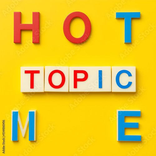 Wallpaper Mural Hot Topic Phrase. Red and Blue Text on Block Letter Tile on Yellow Background. Minimal Aesthetic. Torontodigital.ca