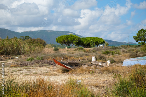 Crushed boat on the beach