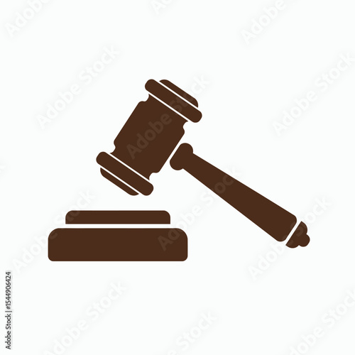 Brown gavel rests on a brown sound block against a white background