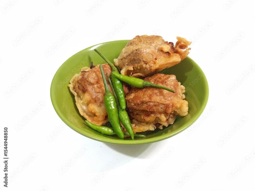 Fototapeta premium Fried tofu coated with wheat flour, served with bird's eye chili