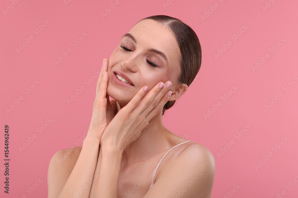 Portrait of beautiful young woman on pink background Portrait of beautiful young woman on pink background