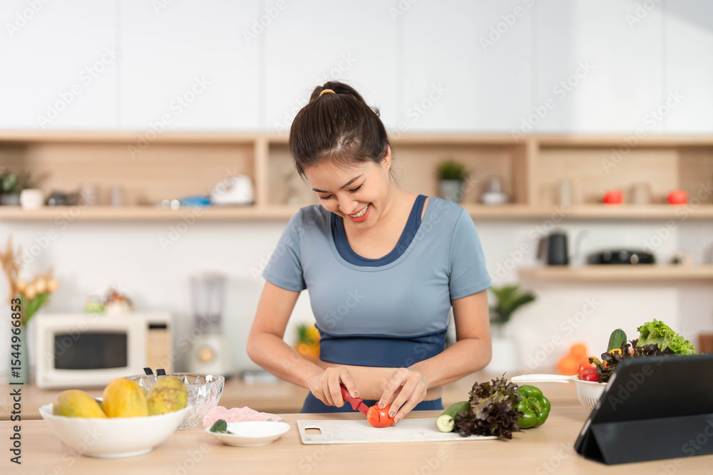 ESG and Healthy Living. Woman preparing fresh vegetables in a modern kitchen. ESG and Healthy Living. Woman preparing fresh vegetables in a modern kitchen.