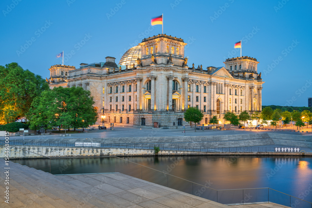 Naklejka premium Reichtag at dawn over Spree river in Berlin. Germany