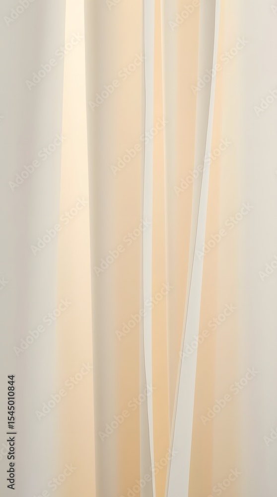 Fototapeta premium Cream-colored sheer curtains gently draped, creating soft light and shadow patterns in a minimalist interior setting.
