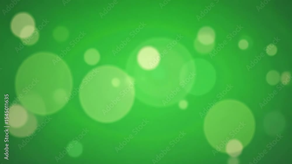 Green screen with bokeh effect and blurred circles in various sizes and light intensities