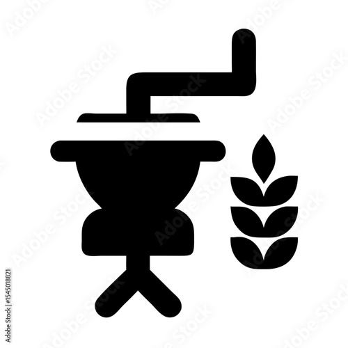 A black icon of a grain mill and wheat branch, used in baking process 