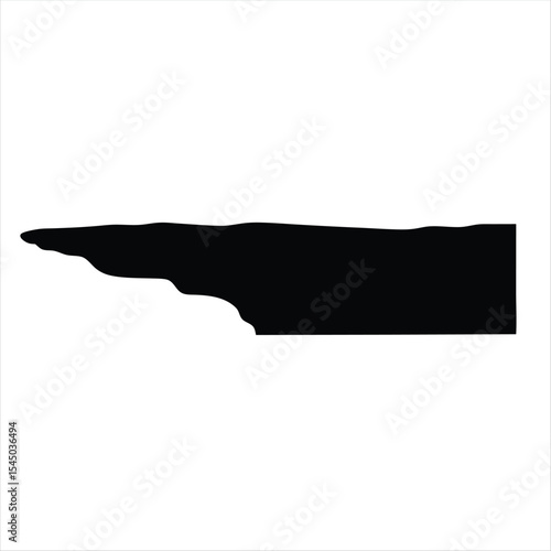 Dramatic black silhouette of a rocky cliff against a bright white background