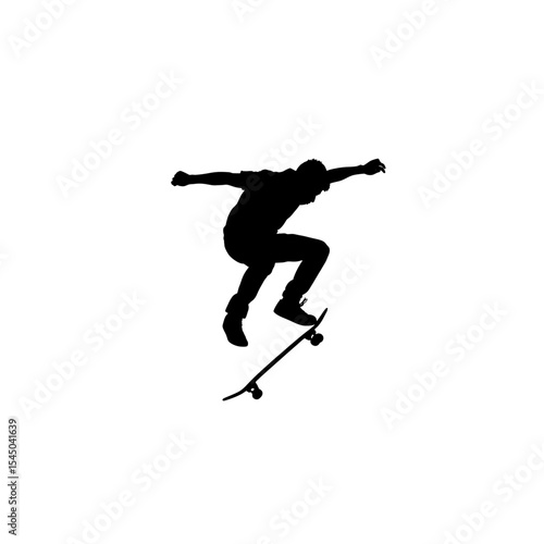 Silhouette of a Skateboarder Performing an Air Trick