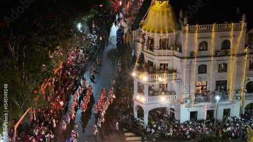 Aerial footage of the Kandy Esala Perahera, Sri Lanka’s most iconic cultural festival. The drone captures the grand procession with traditional dancers, fire performers, drummers, and richly adorned e