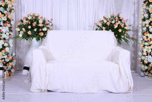 simple white wedding backdrop with rose theme