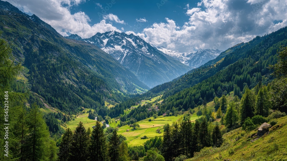 Fototapeta premium Swiss Alps mountain range with lush forest valleys and meadows, countryside in Switzerland landscape. Snowy mountain tops in the horizon, travel destination wallpaper.