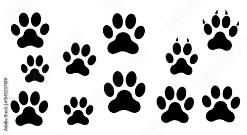 Variety of animal paw print silhouettes for nature and wildlife design