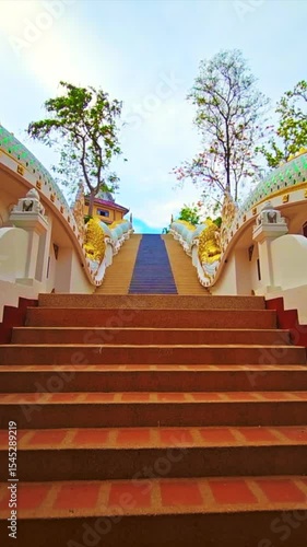 Chiang Mai Series : Naga stairs leading up to Wat Sri Soda in Chiang Mai Province. Public stairs decorated with Thai art, Thailand.