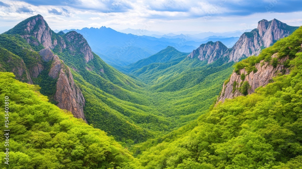 Naklejka premium A breathtaking view of lush green mountains and a deep valley, ideal for nature-related content, travel brochures, or environmental campaigns, evoking tranquility and the beauty of the outdoors,