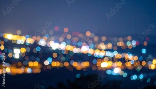 Fototapeta Naklejka Na Ścianę i Meble -  Blurred night city lights with blue and yellow bokeh motion.