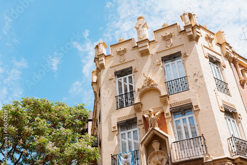 Historic Building Facade With Carved Details and Dragons in Valecia