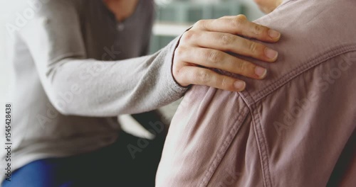 Comforting hand supporting the old woman
