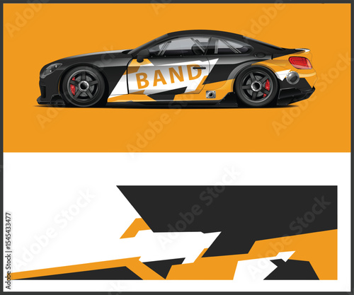 Sleek Black Sports Car with Bold Graphic Wrap Design on Orange Background