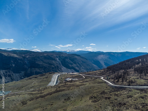 Construction of a new road to the Chulyshman River valley. Mountain pass Katu-Yaryk. Landscape. Mountain dangerous road.