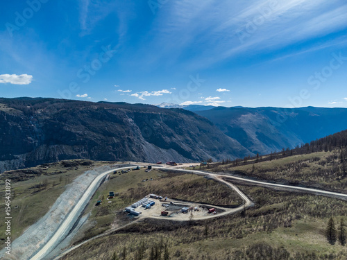Construction of a new road to the Chulyshman River valley. Mountain pass Katu-Yaryk. Landscape. Mountain dangerous road.
