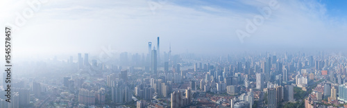 aerial view of Shanghai skyline with heavy fog.