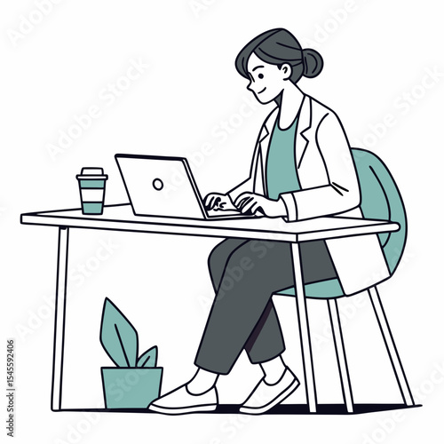 Woman doctor working on laptop at desk in office
