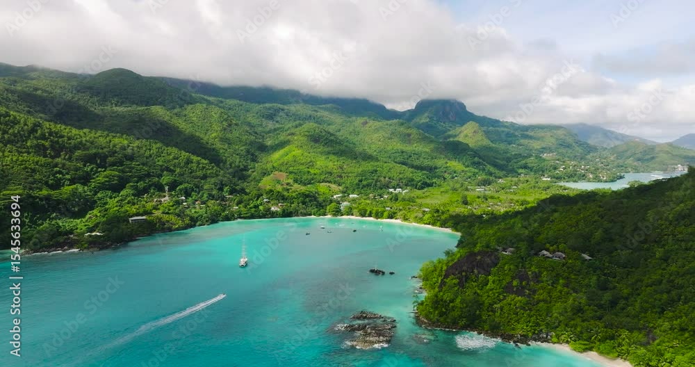 custom made wallpaper toronto digitalScenic bay with turquoise waters, mountains in the background, and green hillsides. Seychelles, Mahe.