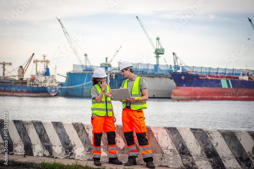 Engineers control worker at international ports in operation Worldwide Sea Ports and Shipping Ports