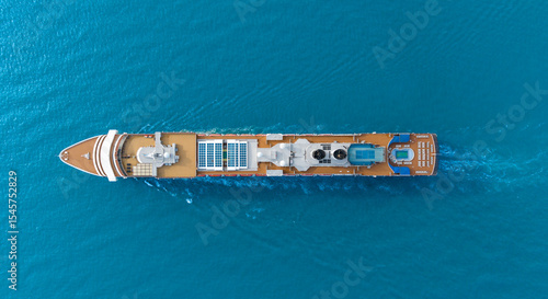 Aerial view of beautiful white cruise ship above luxury cruise in the ocean sea at early in the morning time concept smart tourism travel on holiday take a vacation time on summer