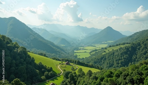 Panoramic view of a valley nestled between rolling hills.