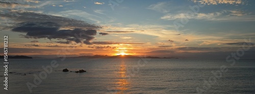 June 22 2025, Matsuyama, Ehime, Japan - An image of a golden sunset of the Seto Naikai Marine National Park