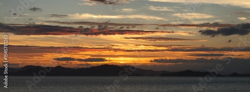 June 22 2025, Matsuyama, Ehime, Japan - An image of a golden sunset of the Seto Naikai Marine National Park