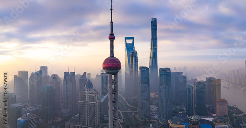 Aerial view of Shanghai skyline in downtown at sunrise.