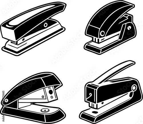 Isolated on white, this set of office staplers and staples are essential business tools for paperwork; staplers  silhouette