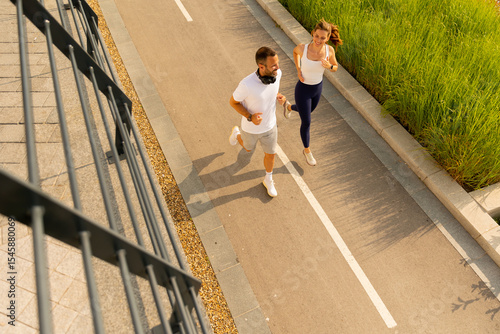 Joyful morning joggers enjo...