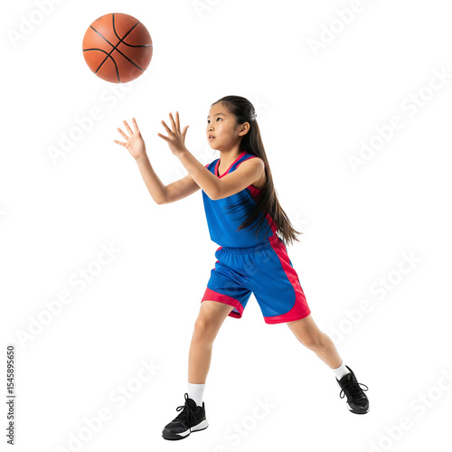 young girl playing basketball 
