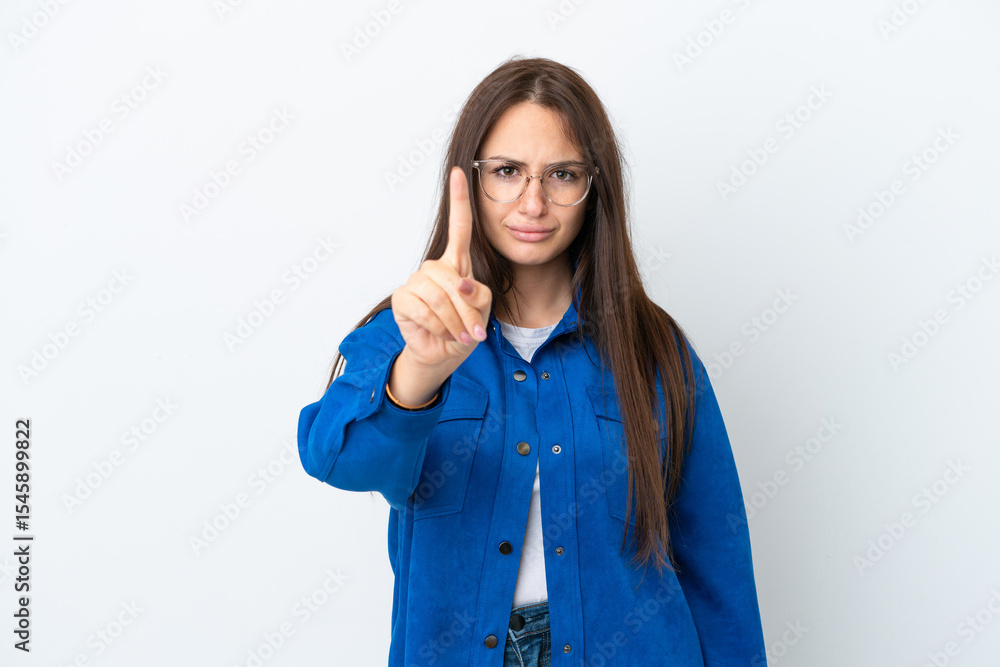 Young Ukrainian woman isolated on white background counting one with serious expression Young Ukrainian woman isolated on white background counting one with serious expression