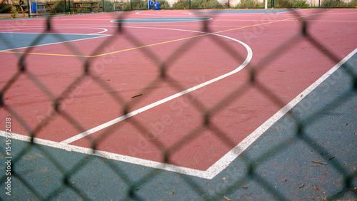 basketball field with metal fence