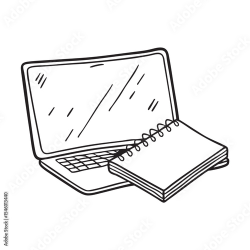 A notepad sitting beside a shut laptop on the table