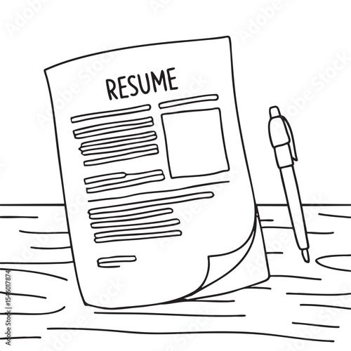A resume next to a pen sitting on a wood surface