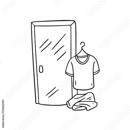 A crumpled undershirt lying close to the bathroom door