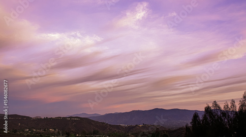 Pale lilac tinted clouds at sunset in tropical Broome,are beautifully hued with soft pink and lavender tones.