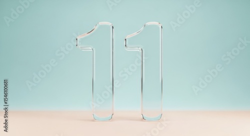 Transparent glass number eleven on a soft pastel blue and beige background minimalistic style