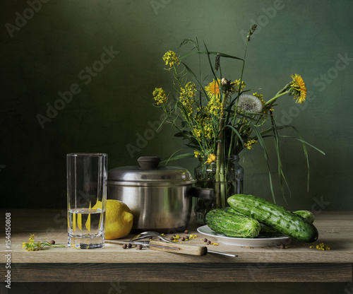still life with cucumbers and wildflowers
