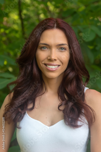 Smiling woman portrait in nature