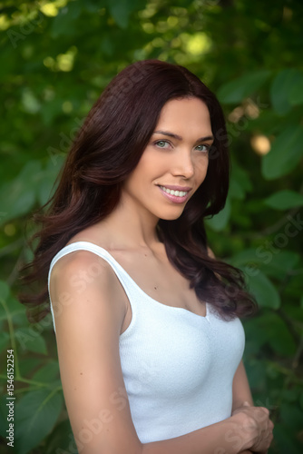 Smiling woman portrait in nature