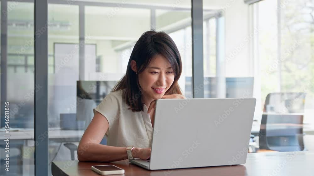 30s middle-aged woman using computer technology app for banker financial work online. Mature Asian professional it specialist businesswoman working on laptop pc sitting at desk in office. Copy space 30s middle-aged woman using computer technology app for banker financial work online. Mature Asian professional it specialist businesswoman working on laptop pc sitting at desk in office. Copy space